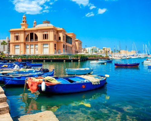 Margherita,Theater,And,Fishing,Boats,In,Old,Harbor,Of,Bari,