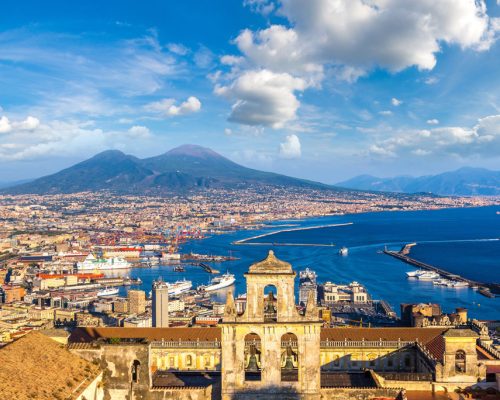 Napoli,(naples),And,Mount,Vesuvius,In,The,Background,At,Sunset