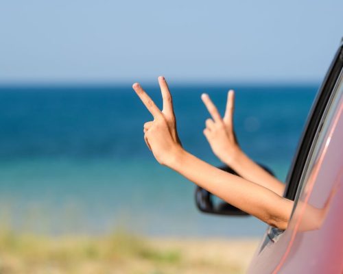 Two,Hands,Show,A,Positive,Gesture,From,The,Car,Window