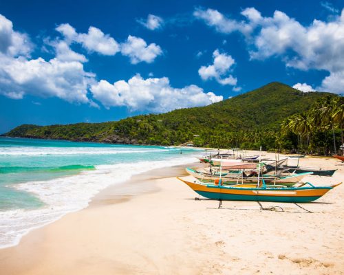 Traditional,Boats,On,Sabang,Beach,,Puerto,Princesa,,Palawan,Island.,Philippines