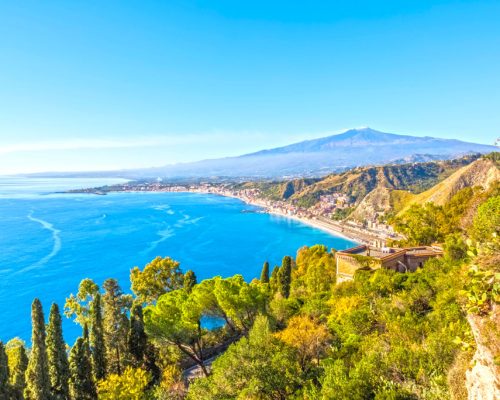 The,Bay,Of,Giardini-naxos,With,The,Etna,And,Catania,In
