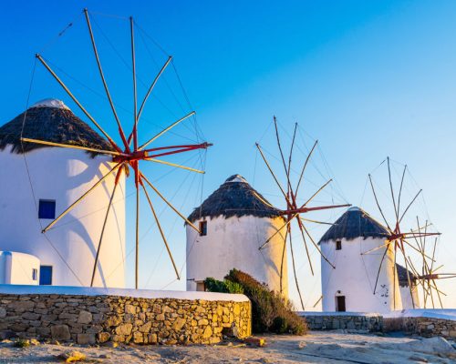 Famous,Mykonos,Town,Windmills,In,A,Romantic,Sunset,,Mykonos,Island,
