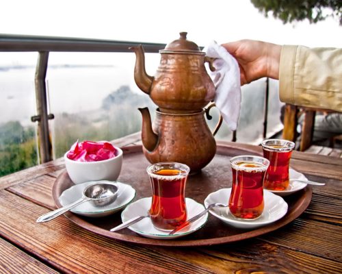 Drinking,Traditional,Turkish,Tea,With,Turkish,Tea,Cup,And,Copper